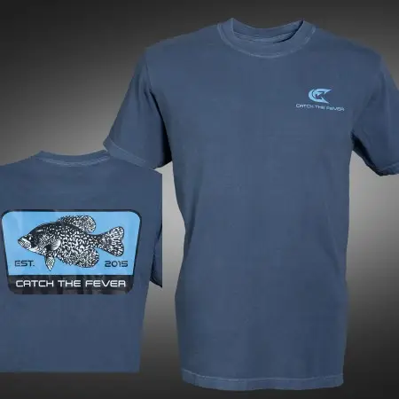 Front and back views of a dark gray Crappie short sleeve lifestyle T t‑shirt featuring a large blue patch with a crappie fish graphic, “EST. 2015” and Catch The Fever® branding on the back, and a small Catch The Fever® logo on the chest.